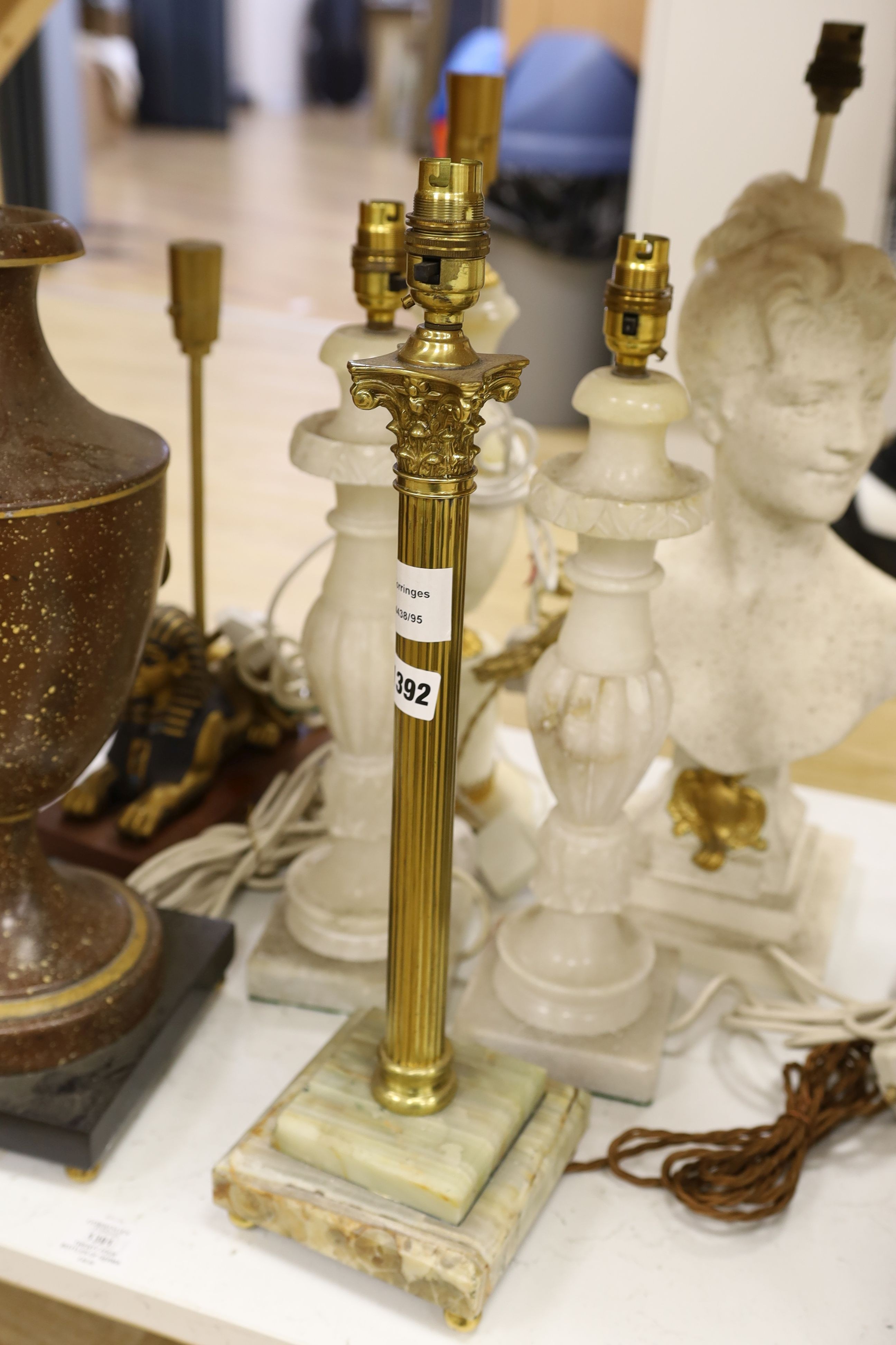 A selection of assorted table lamps including a sphinx-ed base and other decorative bases